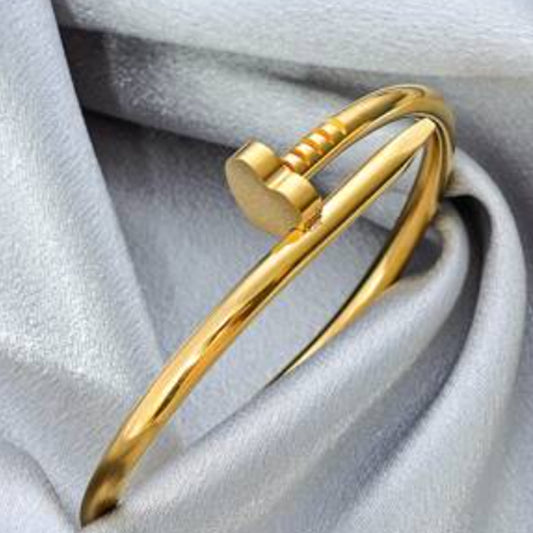 กำไลตะปูสีทอง Y019